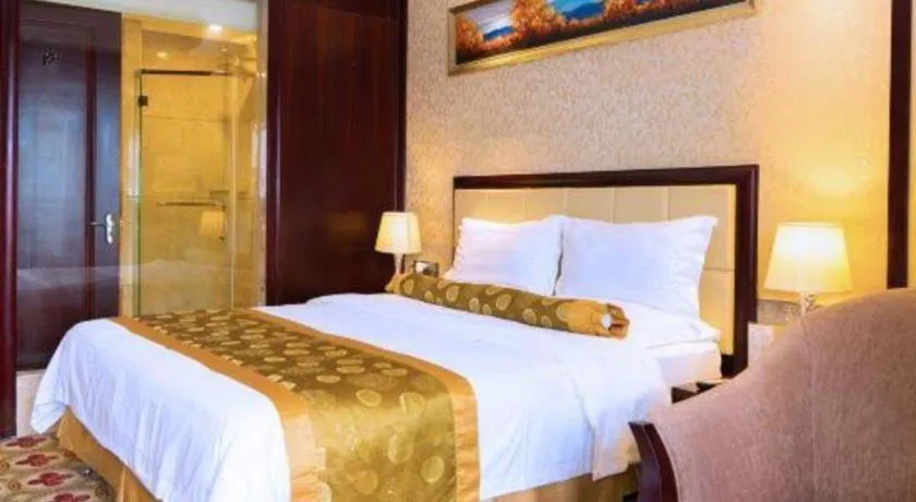 Bed in Taishan Bojue Hotel