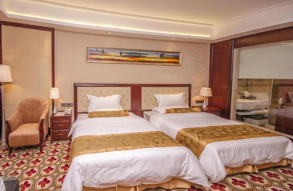 Bed in Taishan Bojue Hotel