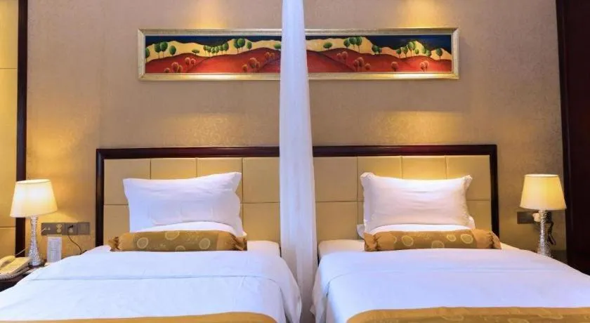Bed in Taishan Bojue Hotel