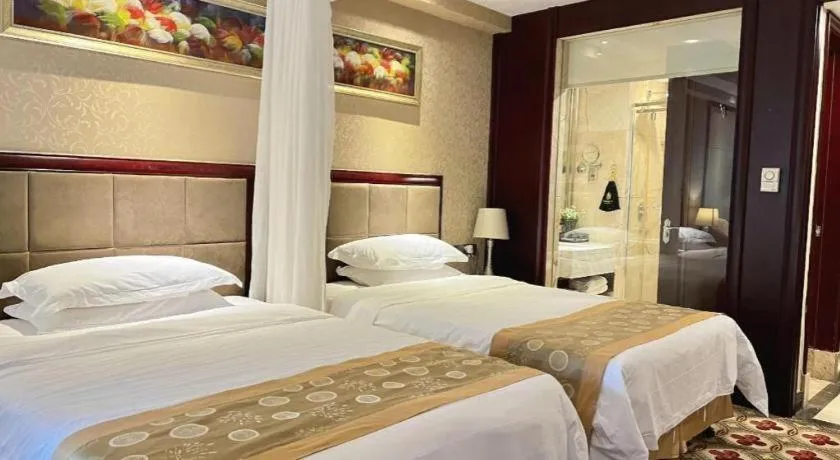 Bed in Taishan Bojue Hotel