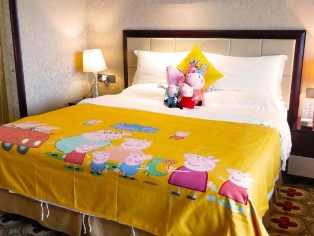 Bed in Taishan Bojue Hotel