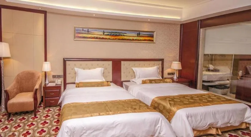 Bed in Taishan Bojue Hotel