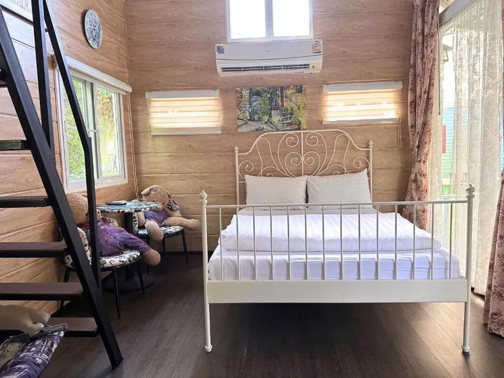 Bed in Greenview Resort