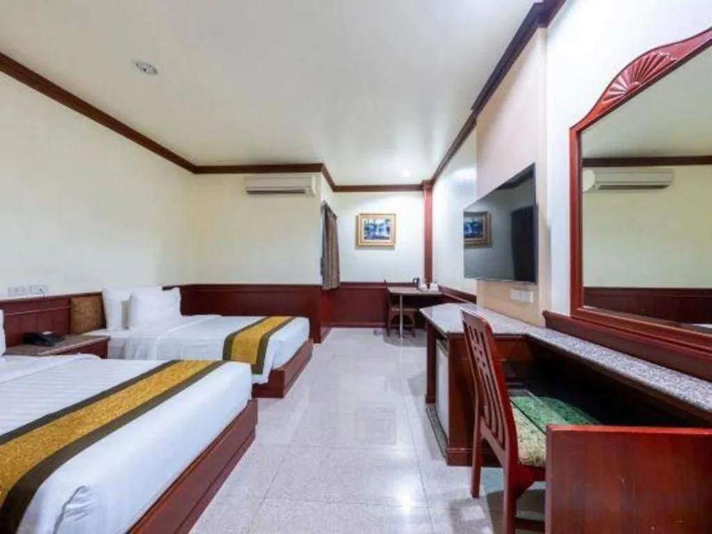 Bed in Nartsiri Hotel