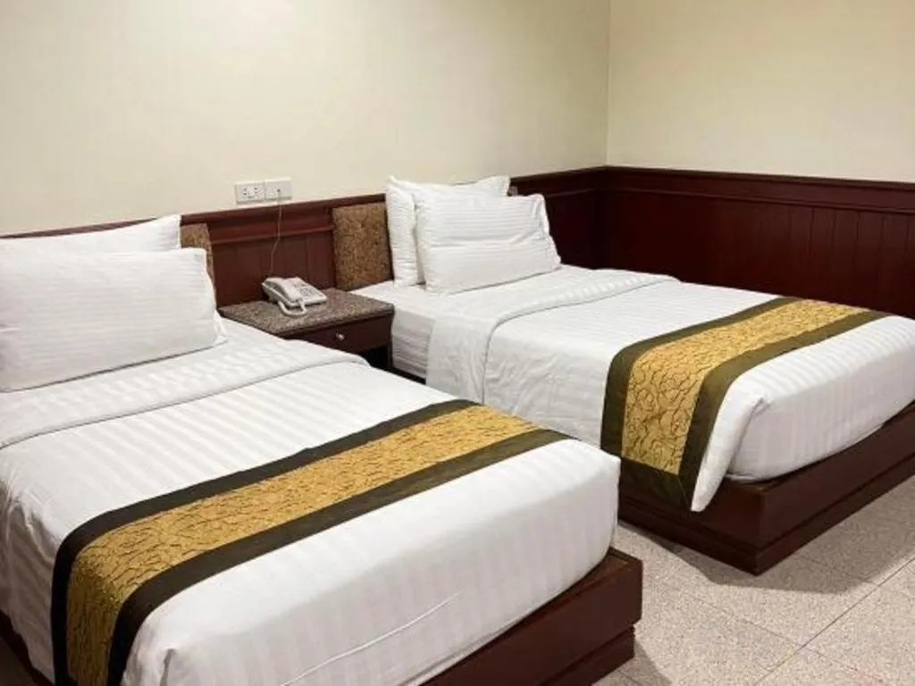 Bed in Nartsiri Hotel