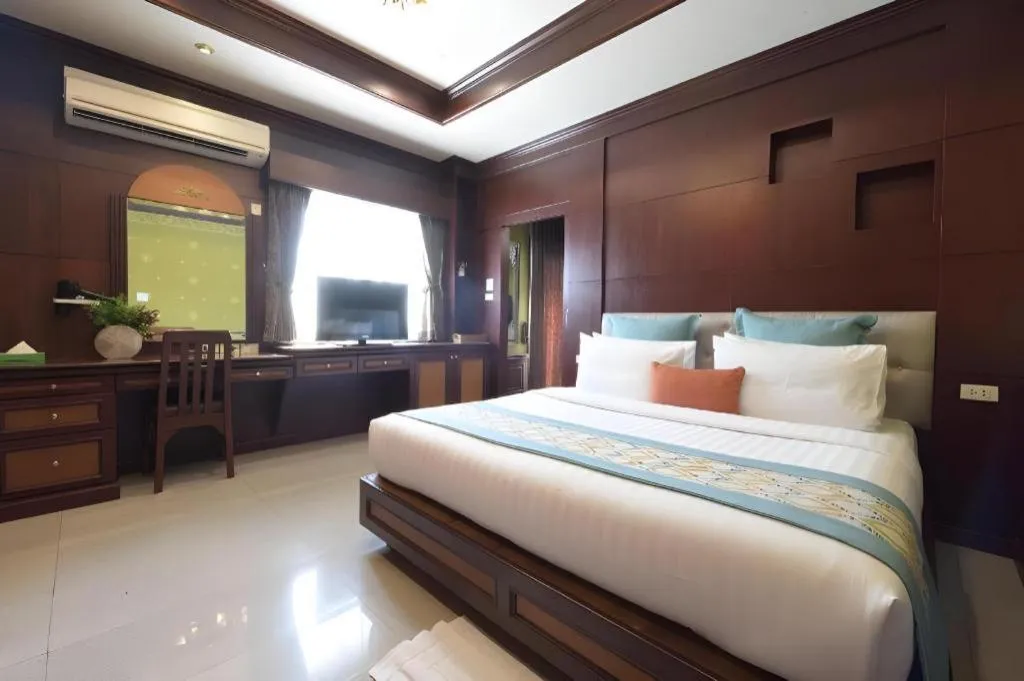 Bed in Nartsiri Hotel