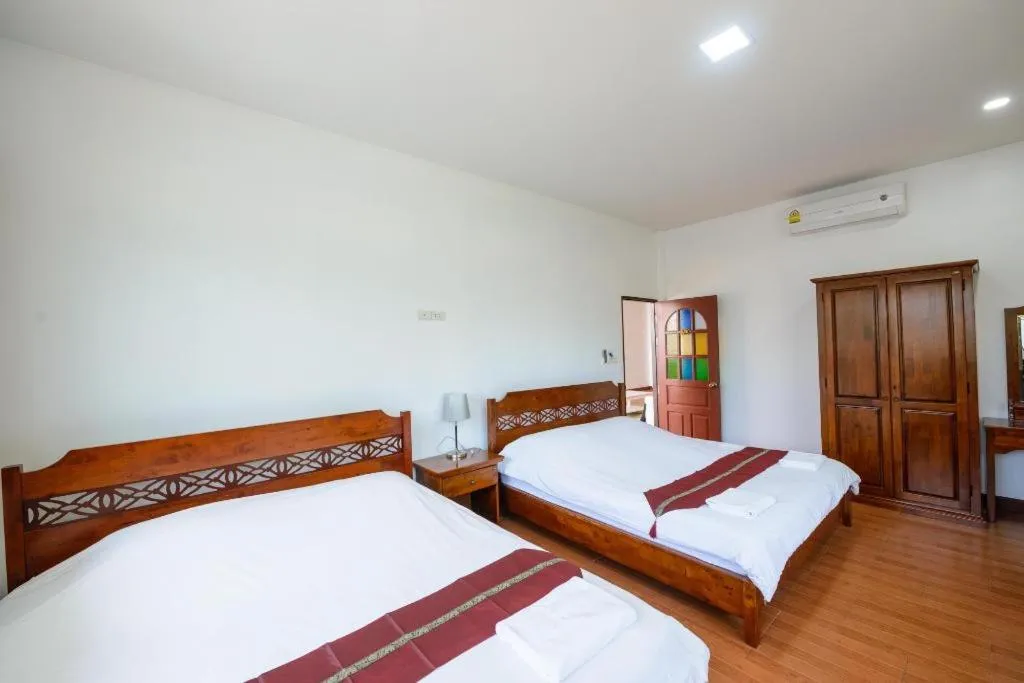 Bed in Baan Suan Aou Khai