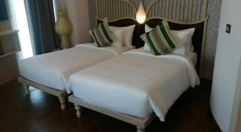Bed in Baisirimaya Hotel