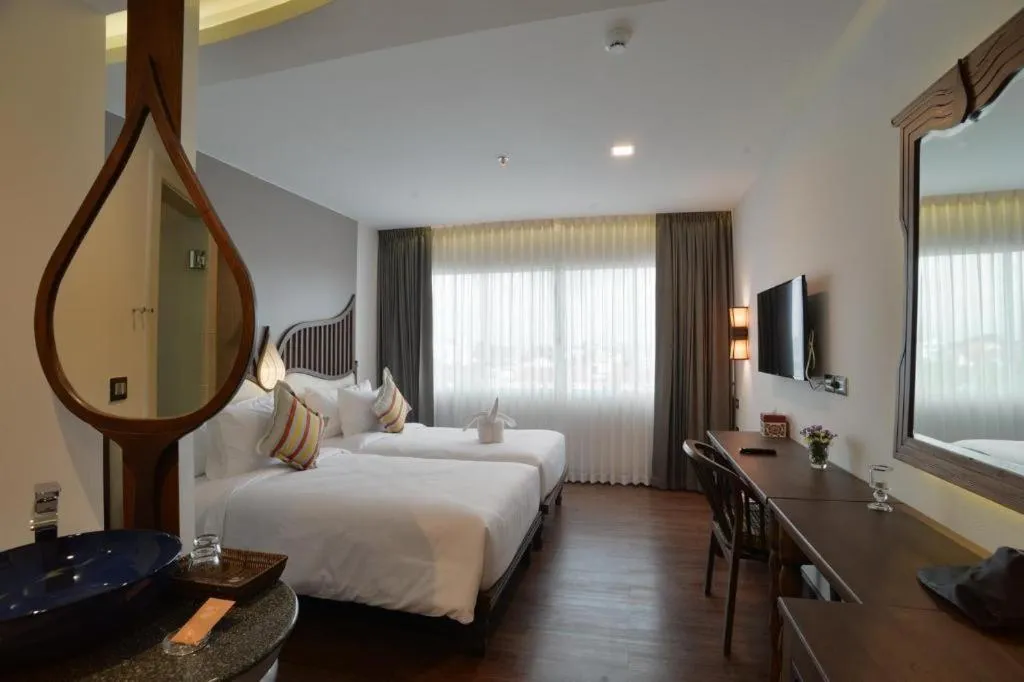 Bed in Baisirimaya Hotel