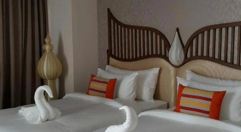 Bed in Baisirimaya Hotel