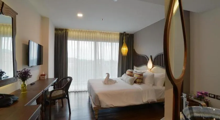 Bed in Baisirimaya Hotel