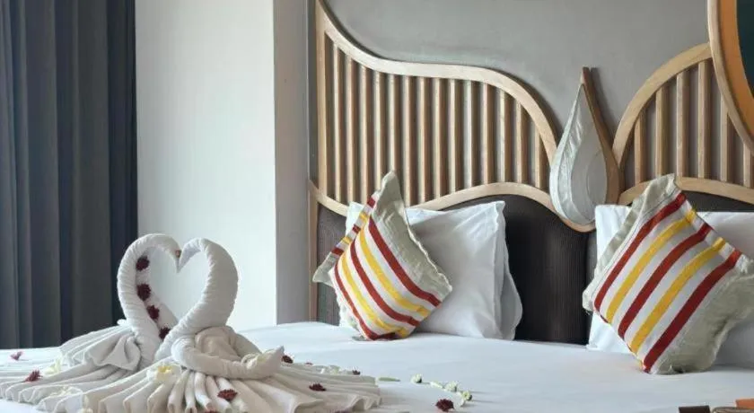 Bed in Baisirimaya Hotel