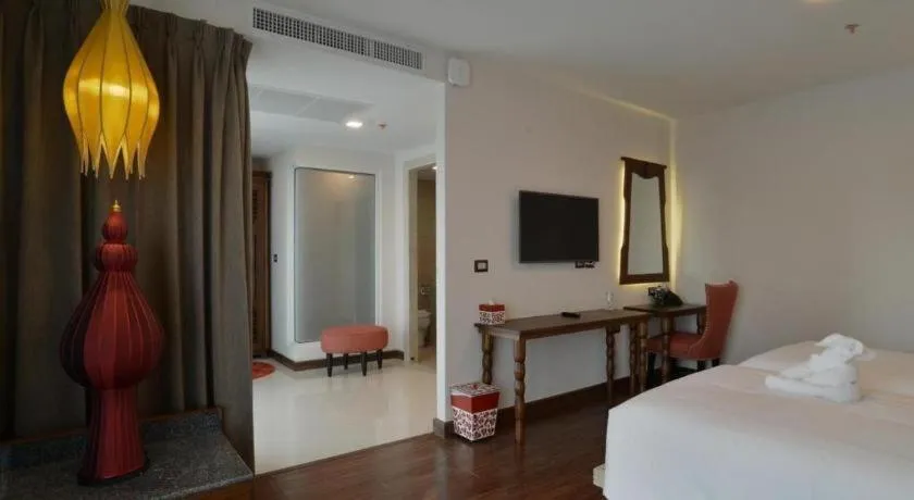 Bed in Baisirimaya Hotel