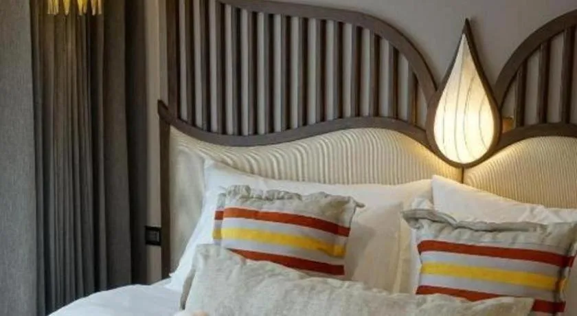 Bed in Baisirimaya Hotel