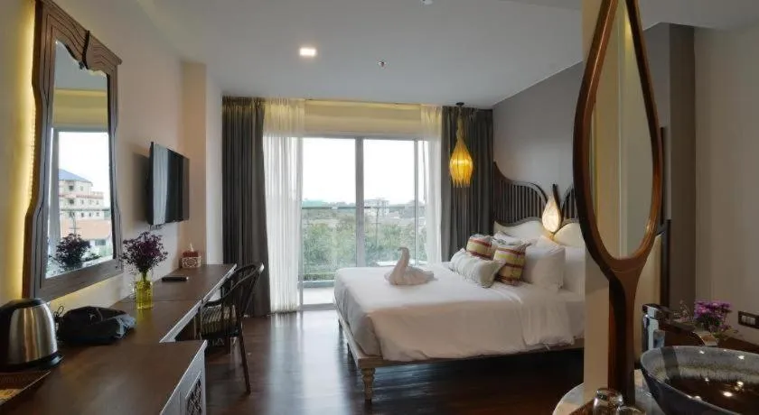 Bed in Baisirimaya Hotel