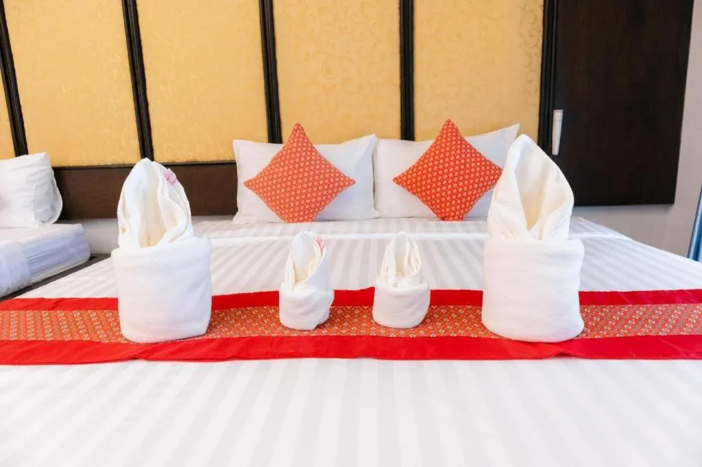 Bed in Poochommhok Resort