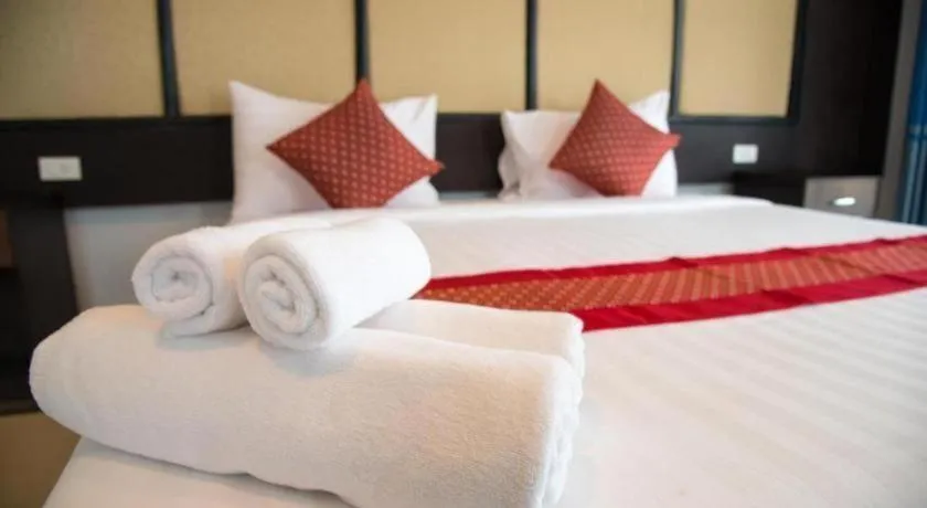 Bed in Poochommhok Resort