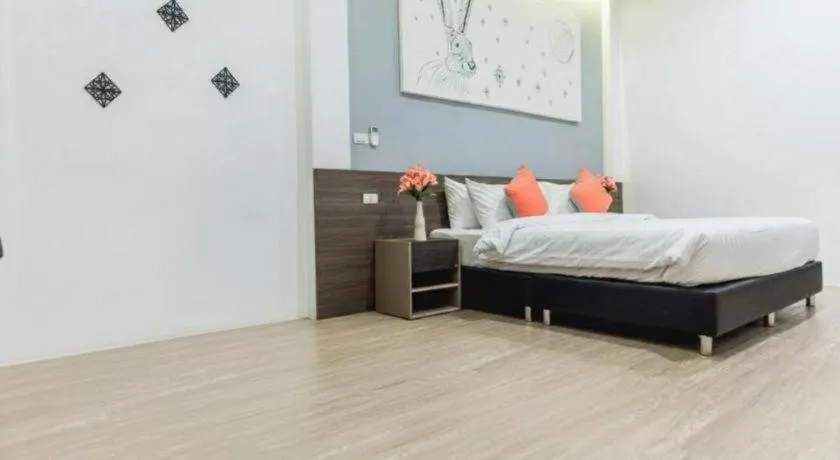 Bed in PIMDARA HOTEL