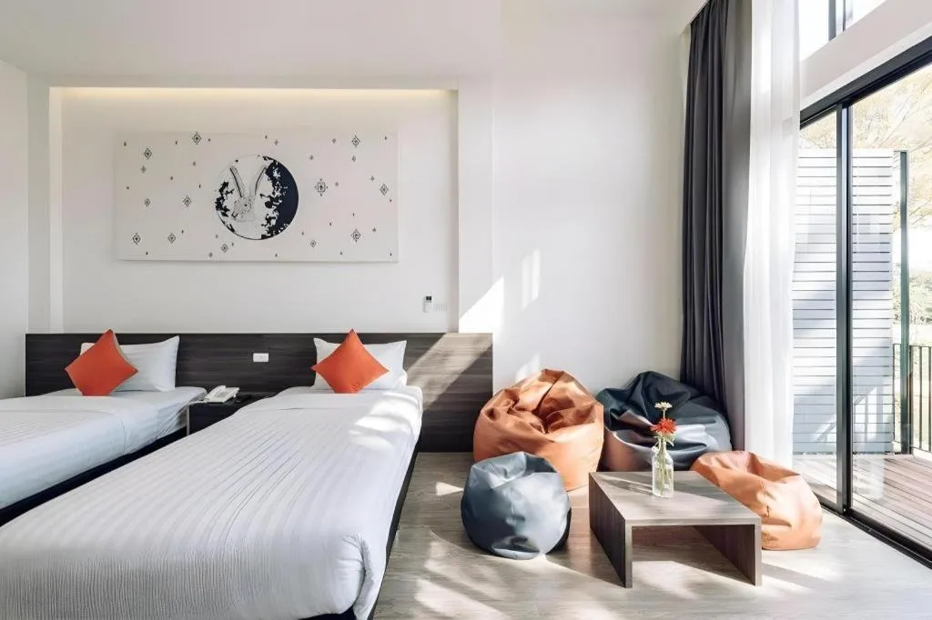 Bed in PIMDARA HOTEL