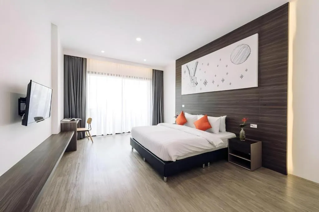 Bed in PIMDARA HOTEL