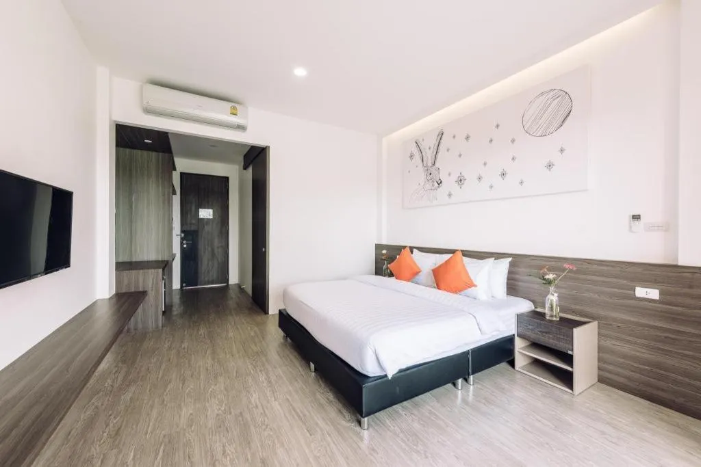 Bed in PIMDARA HOTEL