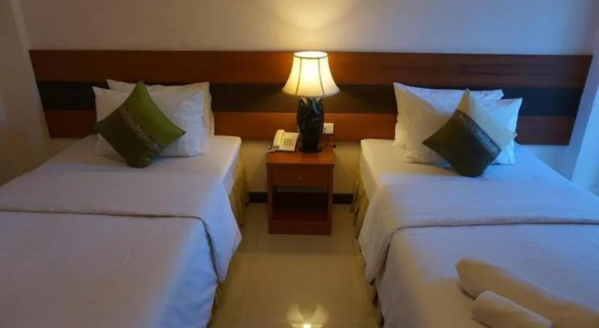 Bed in Sirimathani Hotel