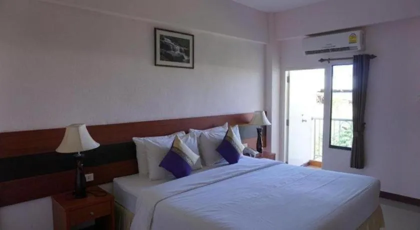 Bed in Sirimathani Hotel