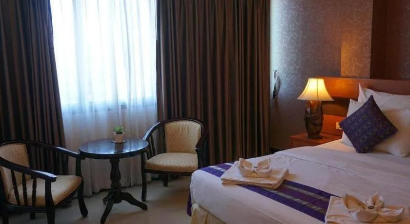 Bed in Sirimathani Hotel