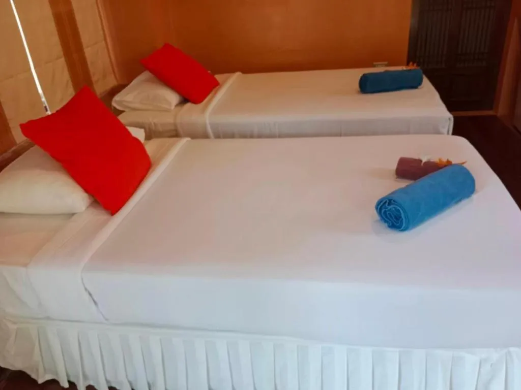 Bed in Ko Kut Ao Phrao Beach Resort