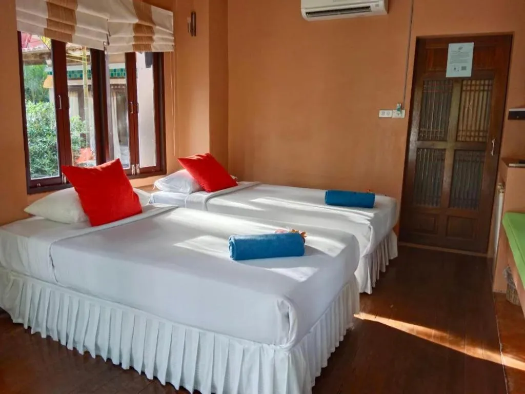 Bed in Ko Kut Ao Phrao Beach Resort