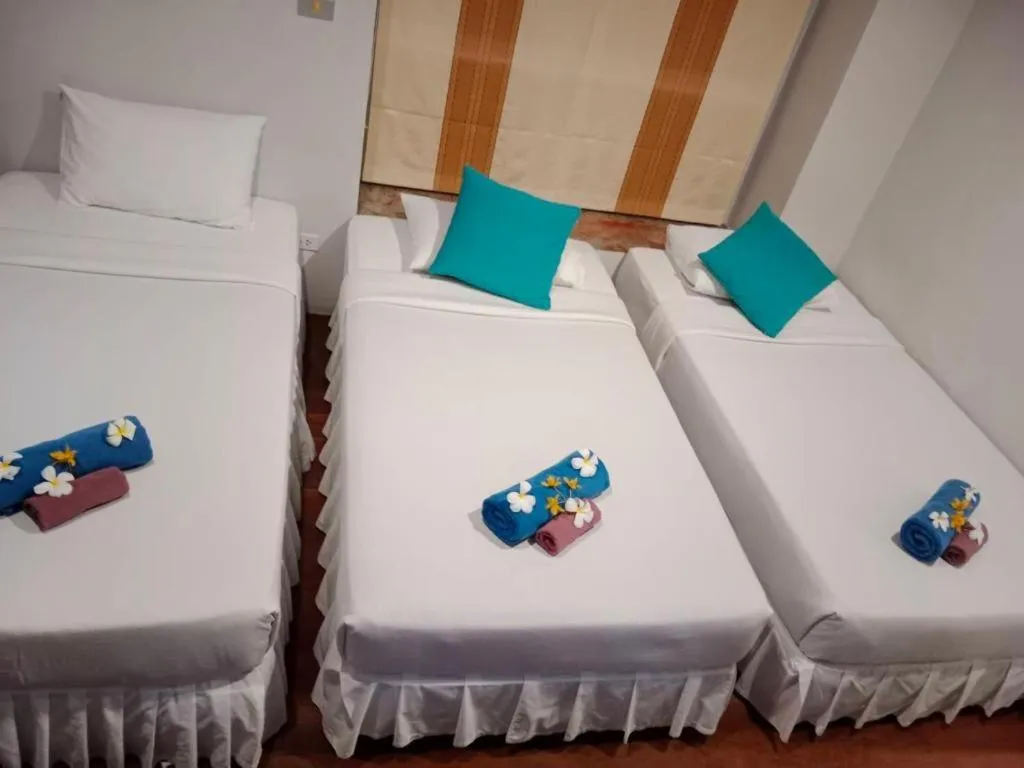 Bed in Ko Kut Ao Phrao Beach Resort