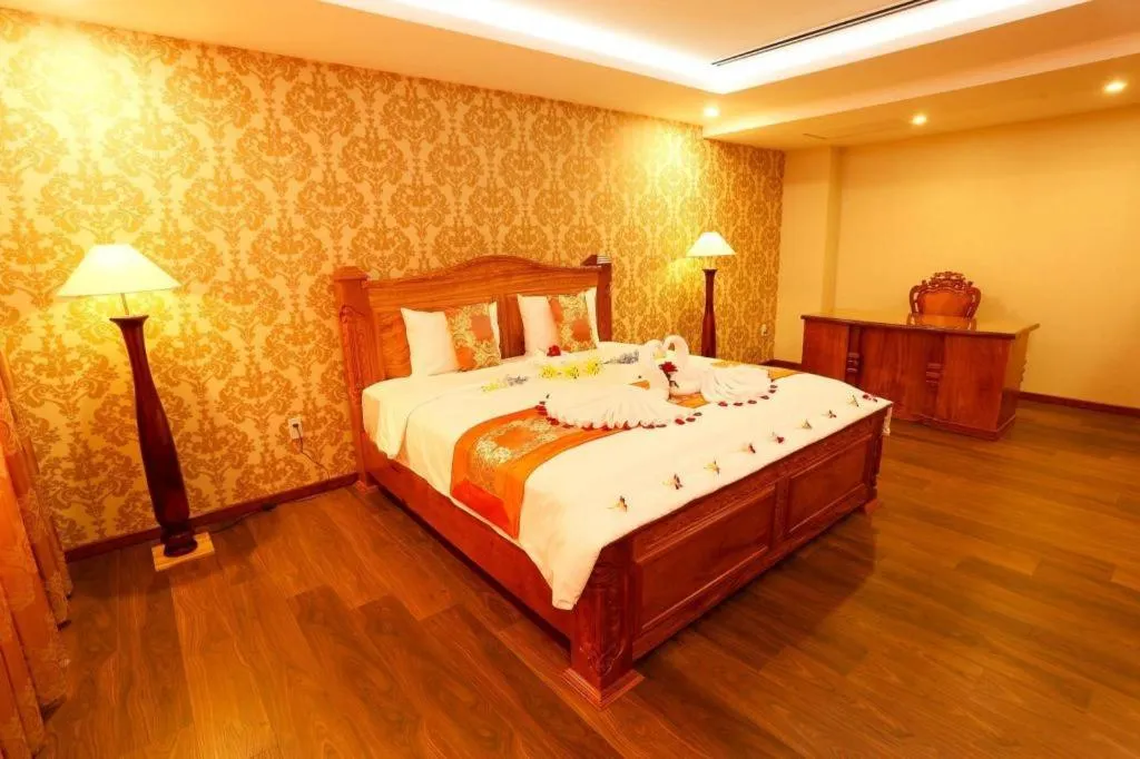 Bed in New Palace Bac Lieu Hotel