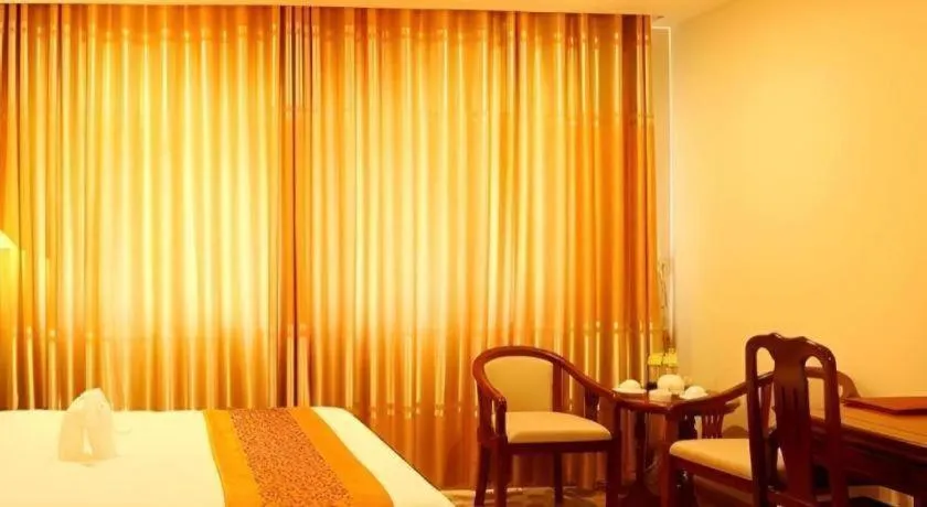 Bed in New Palace Bac Lieu Hotel