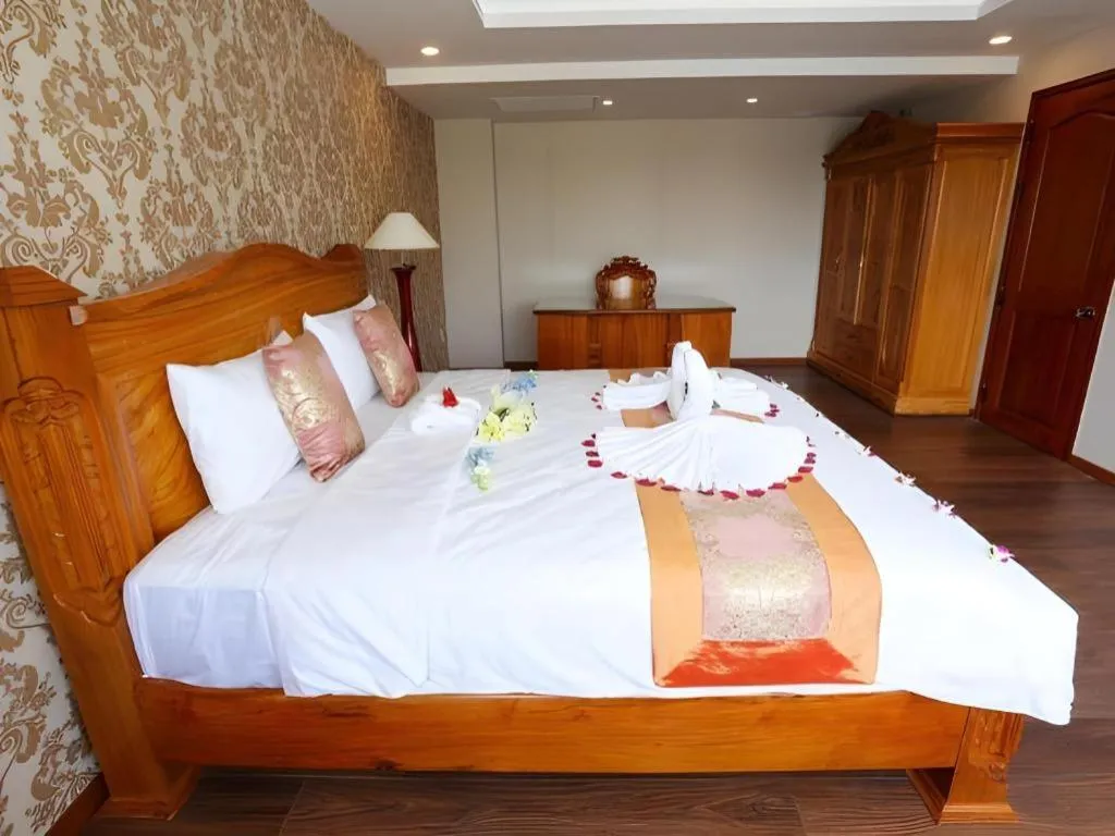 Bed in New Palace Bac Lieu Hotel