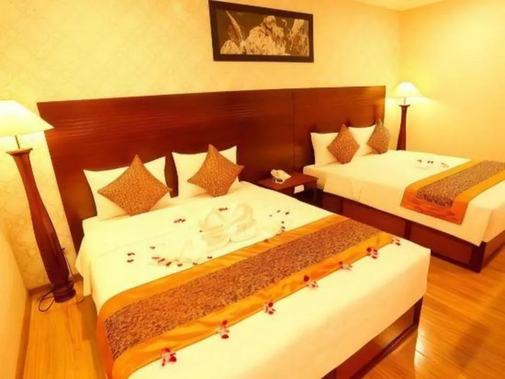 Bed in New Palace Bac Lieu Hotel