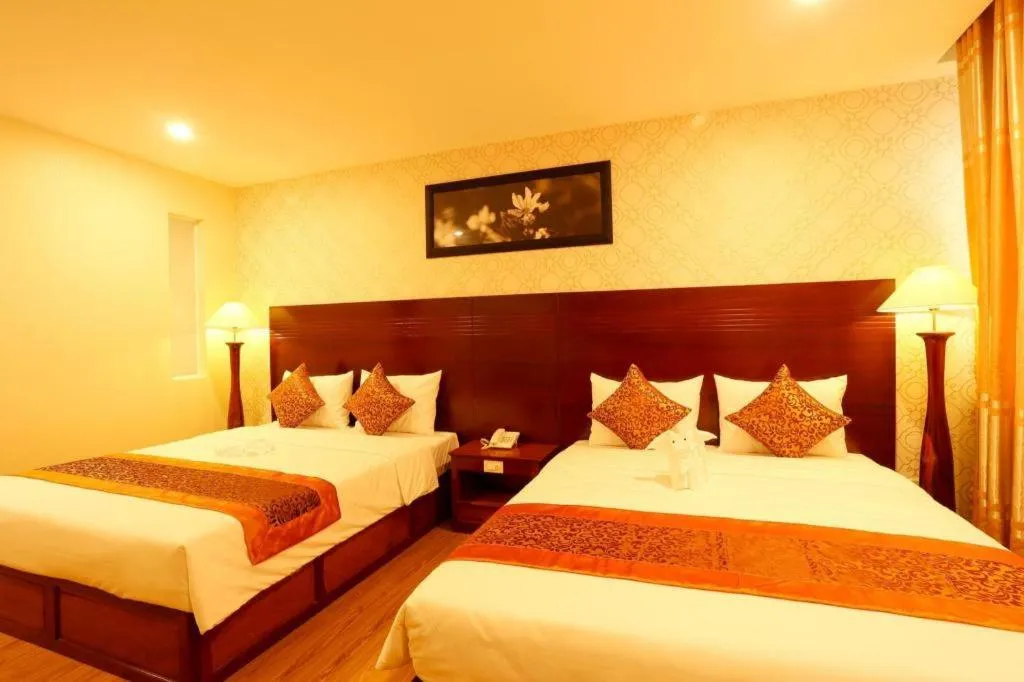 Bed in New Palace Bac Lieu Hotel