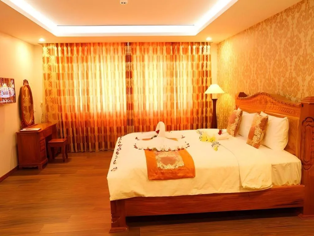 Bed in New Palace Bac Lieu Hotel