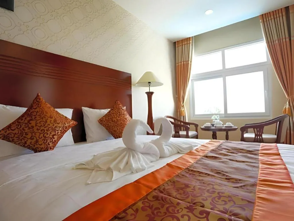 Bed in New Palace Bac Lieu Hotel