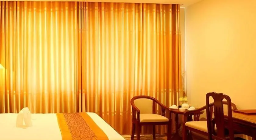 Bed in New Palace Bac Lieu Hotel