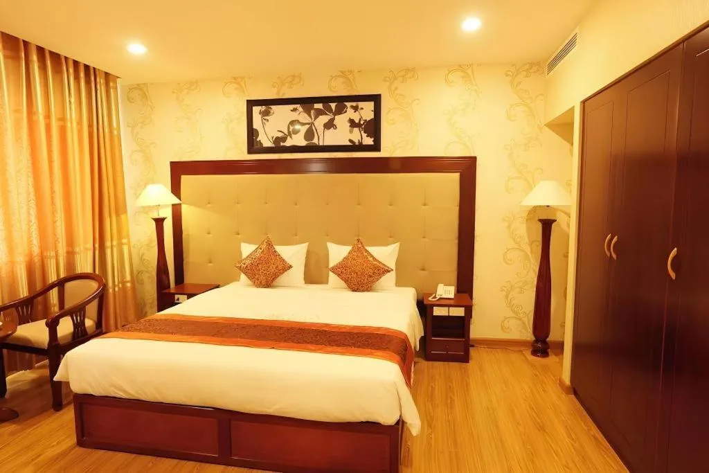 Bed in New Palace Bac Lieu Hotel