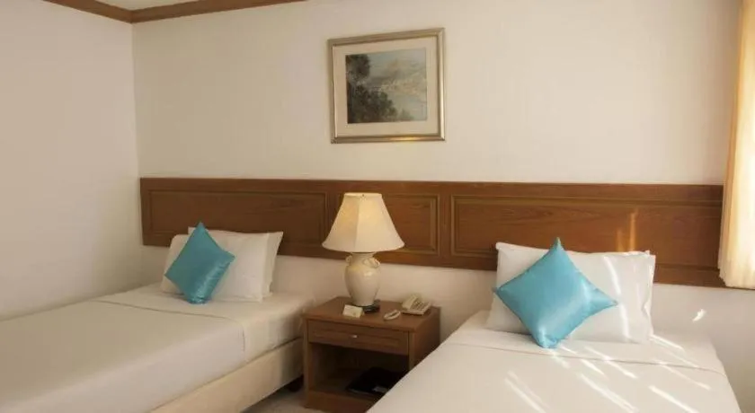 Bed in Lido Beach Hotel