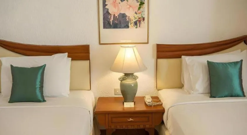 Bed in Lido Beach Hotel