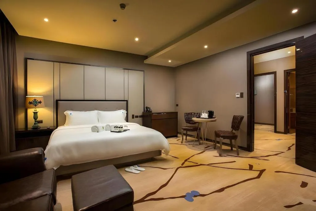 Bed in Lotus Blu Hotel