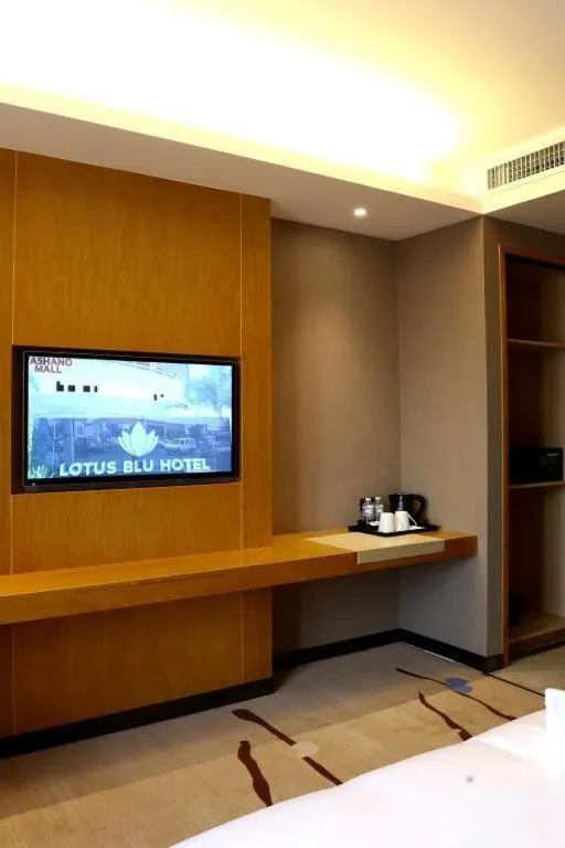 Bed in Lotus Blu Hotel