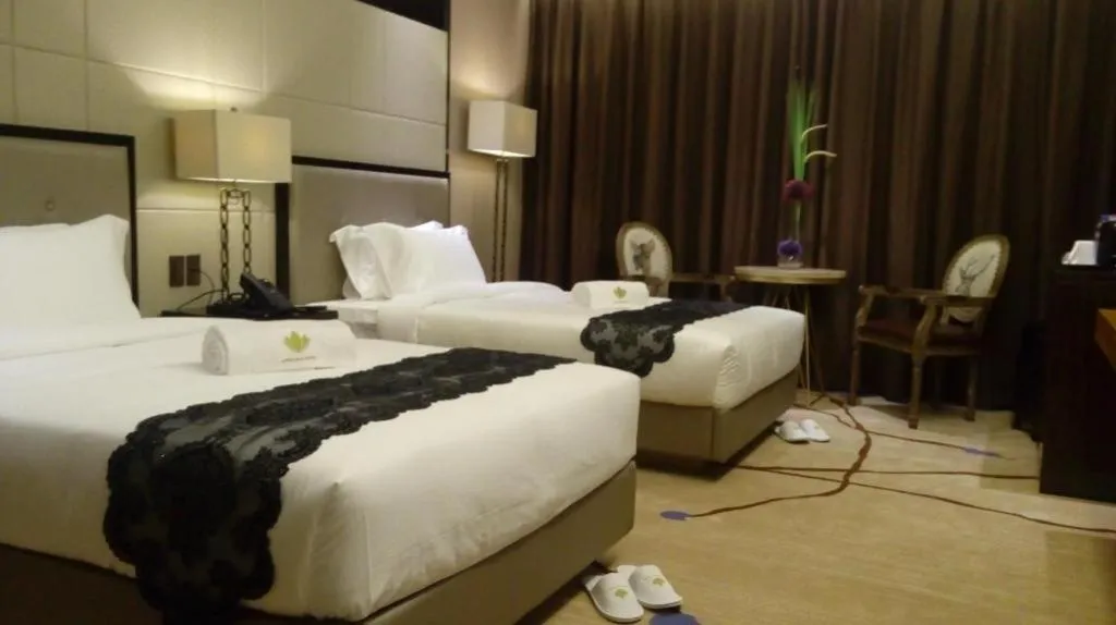 Bed in Lotus Blu Hotel