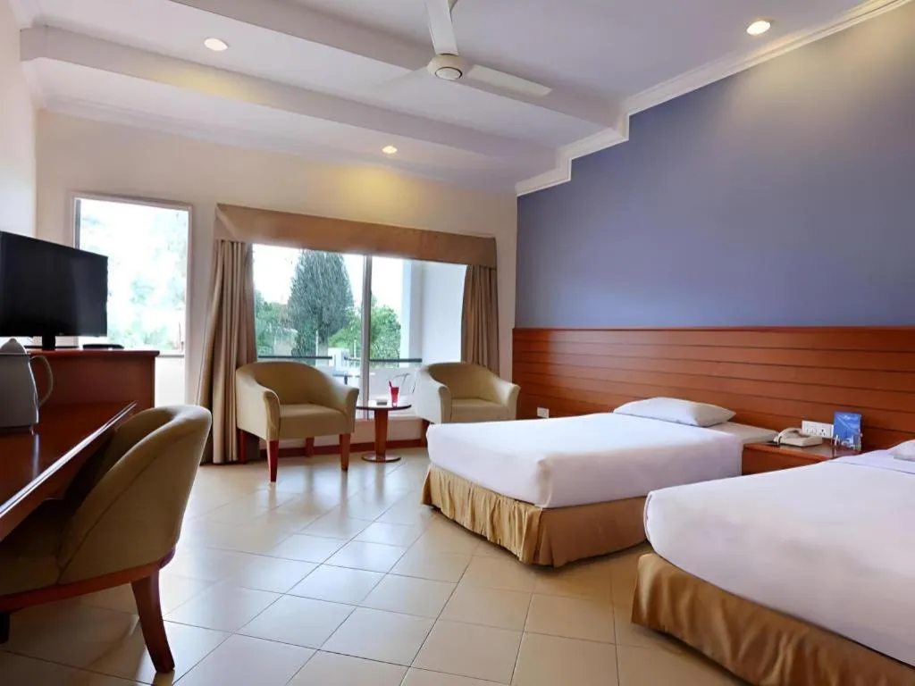 Bed in Hotel Niagara Parapat