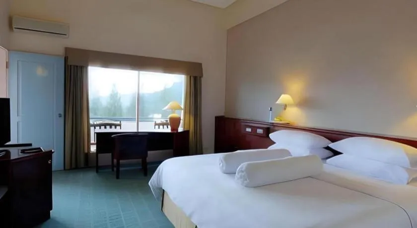 Bed in Hotel Niagara Parapat