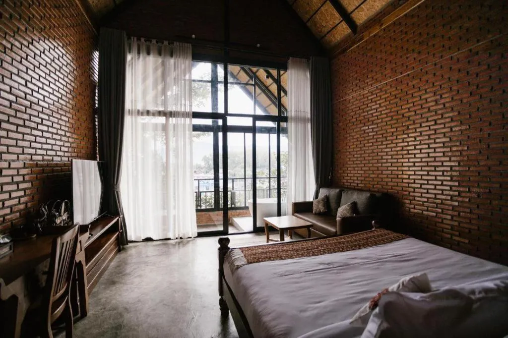 Bed in Cocoa Valley Resort