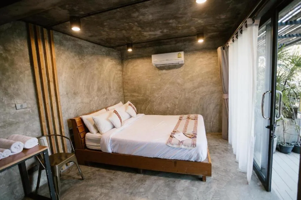 Bed in Cocoa Valley Resort