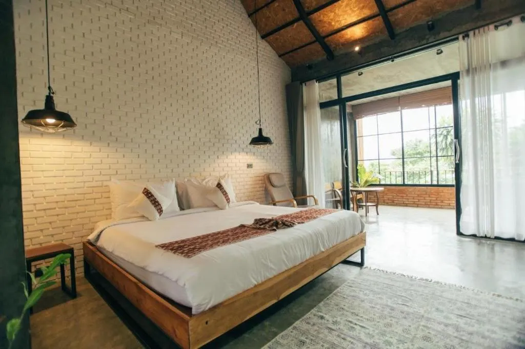 Bed in Cocoa Valley Resort